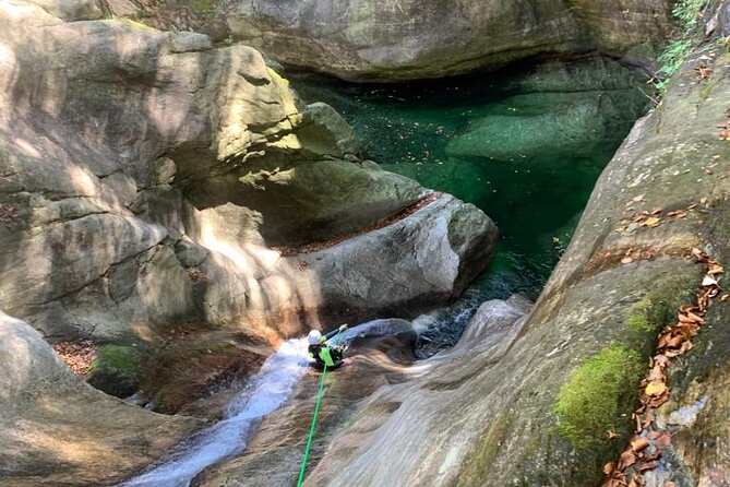 Basic Corippo Canyoning Experience in Valle Verzasca - Rock pools, cold water, and natural slides