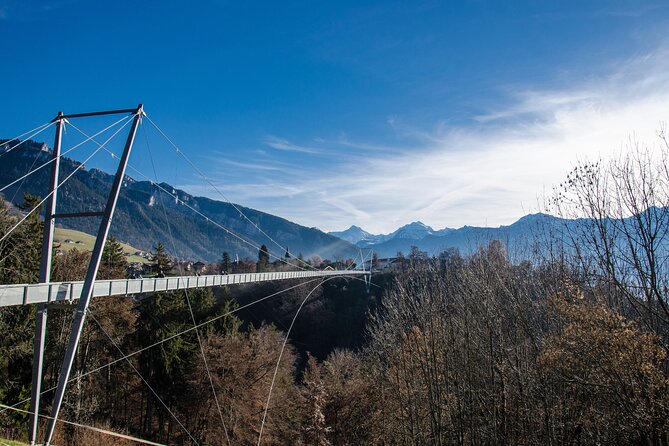 Beatus Caves, Panoramic Bridge, Nature Park Blue Lake and Lake Thun Cruise - Crossing the 340-meter Sigriswil suspension bridge