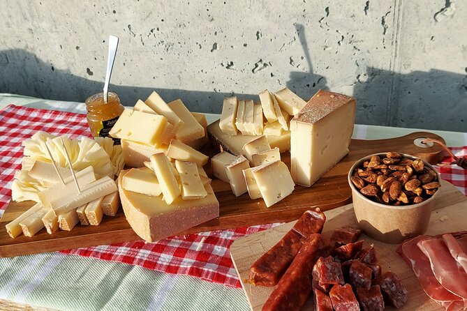 Cheese and chocolate on mountain summit - Who will enjoy this mountain picnic