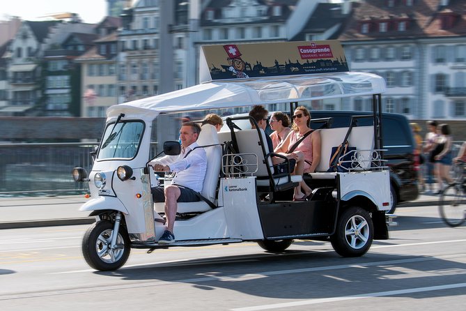 City Tour Plus Lucerne by Etuktuk - The Lion Monument and streets beyond the postcard center
