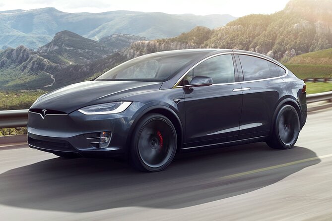 CO2-Offset|Luxury Eco Sedan Arrival from BRN Airport to Bern City - Inside the Tesla X or similar luxury car