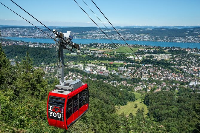 Culinary Tour from Zurich with Traditional Swiss Cheese Fondue Dinner - A sunset table above Lake Zurich