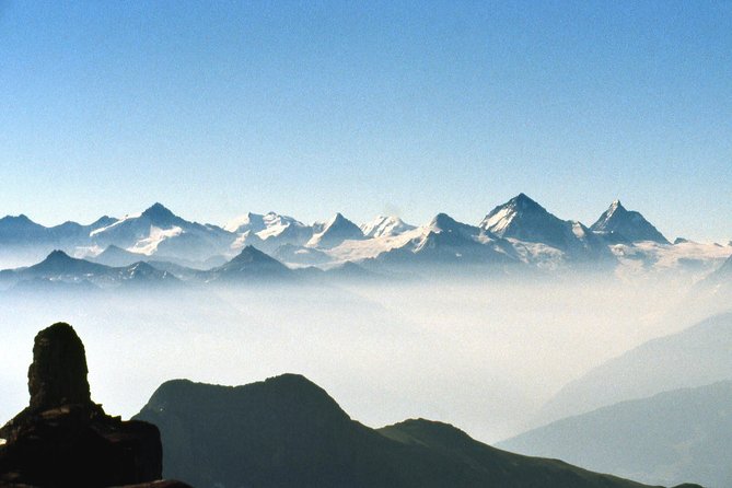 Day trip to Glacier 3000 from Montreux - Les Diablerets, a chalet village with a mountain above it