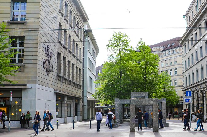 Discover the Zurich Banking Scene with a Local - Walking Dreikönigstrasse and reading the bank district