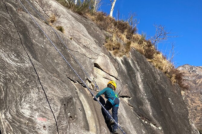 Family rock climbing near Locarno - Safety training before anyone climbs