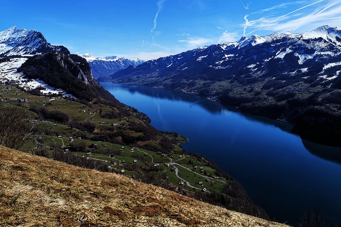 From Zurich: Breathtaking waterfall and lakes private tour - Walking behind water near Linthal