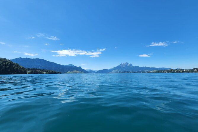 Lake Lucerne boat tour for a full day! - Swimming, sun, and a chance to steer
