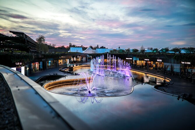 Luxury Outlet Shopping Day Trip from Geneva to Lyon - Arriving at Torino Outlet Village