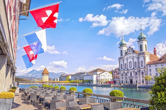 Luzern Elegance: Private City Walk and Panoramic Lake Cruise - Mühlenplatz shows Lucerne at a human scale