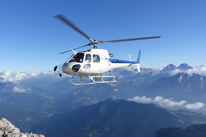 Matterhorn helicopter tour - longest scenic flight from Bern over the Swiss Alps - Glaciers, mountain huts, and the Blüemlisalp range