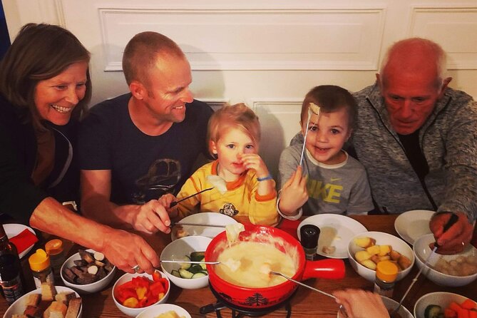 Night Sledding and Fondue Feast Interlaken - Hot chocolate before the mountain ride