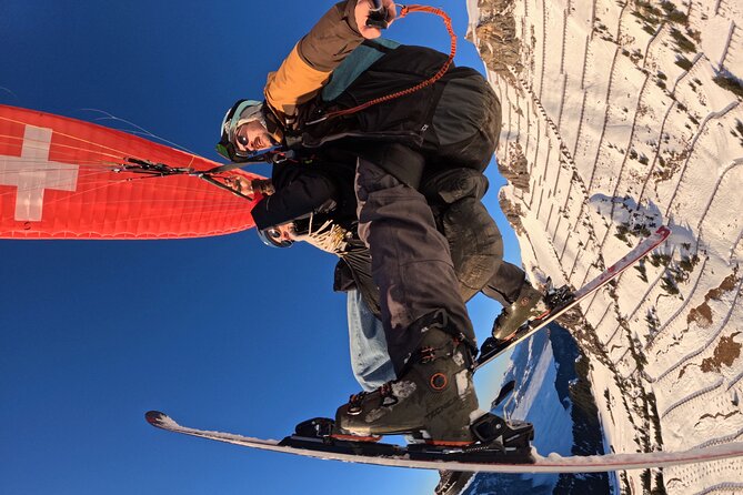 Paragliding male - Flying above Grindelwald instead of merely looking up