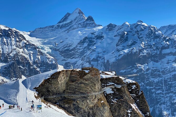Private Grindelwald First and Alpine Villages Tour from Lucerne - Iseltwald and the turquoise waters of Lake Brienz
