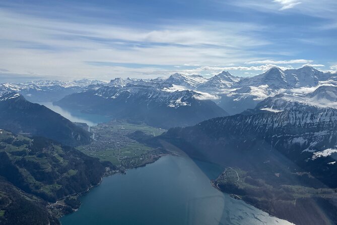 Private Swiss Alps helicopter tour over snow covered mountain peaks and glaciers - Interlaken from above
