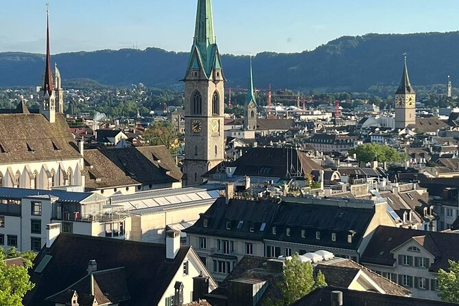 Small Group Zurich Walking Tour, Cruise and LINDT Factory - Walking through Zurich’s Old Town