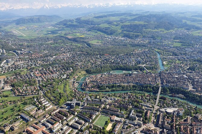 Swiss Capital city helicopter sightseeing tour - the ideal flight to see Berne - Gurten opens the view toward the Alps