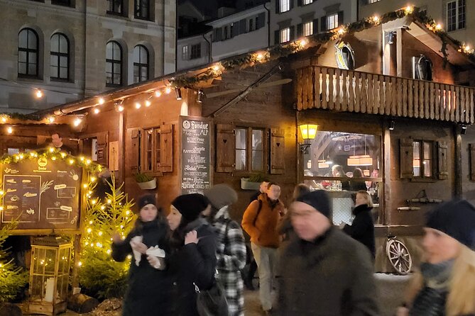 Zurich Christmas Market Tour - Grossmünster, fondue, and a classic Zurich view