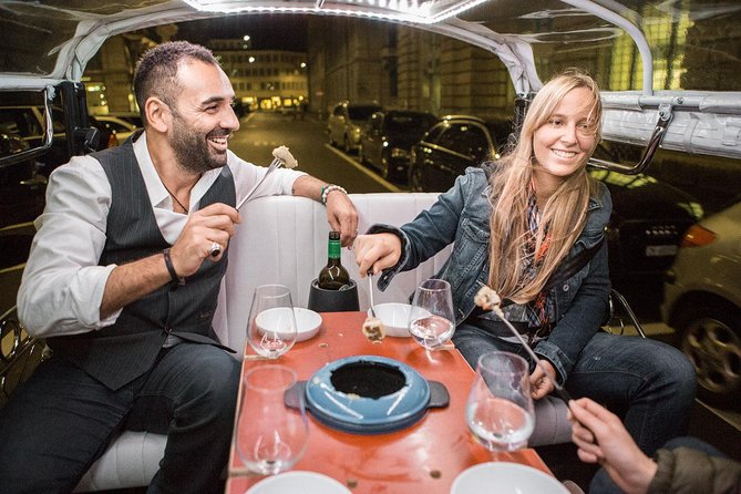 Zurich eTukTuk Private Tour - with Cheese Fondue and Wine - Bahnhofstrasse and the Bahnhofplatz area