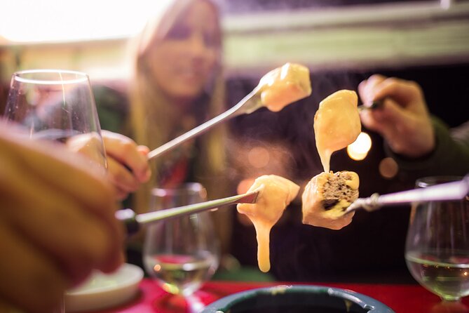 Zurich eTukTuk Private Tour - with Cheese Fondue and Wine - Predigerplatz and the Swiss National Museum area