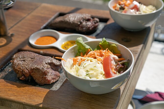Zürich eTukTuk Tour - Hot Stone BBQ and Wine - Bahnhofstrasse and the first city views