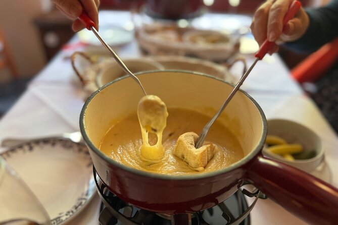 Zurich Food Tour with 10 Local Delicacies, Cheeses & Chocolates - Fraumünster, St. Peter’s, and the old-town views